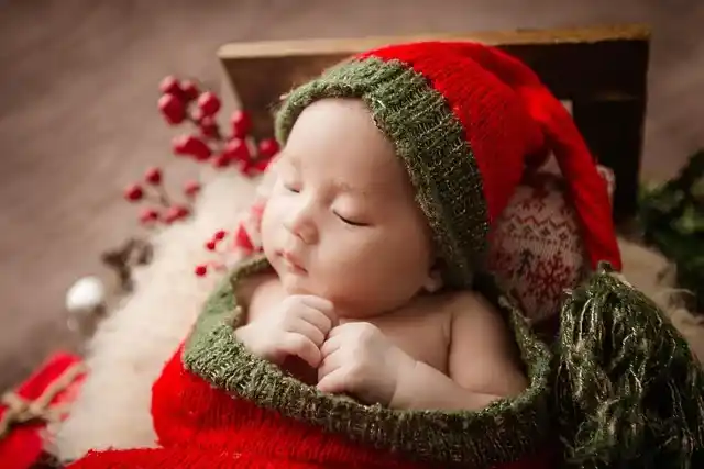Baby sleeping peacefully during 5 month sleep regression with tips for new moms